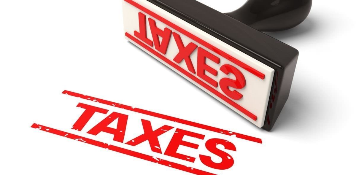 Image of a stamp bearing the word Taxes