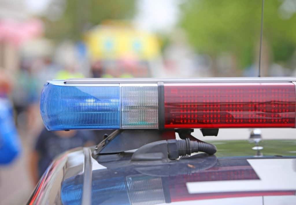 Image of police lights atop car