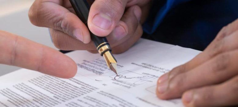 Image depicting a contract signing