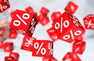 Image of dice bearing percentage signs