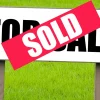 Image of a sold sign on a property on the market