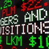 Image of the words "Mergers and Acquisitions" on a stock ticker