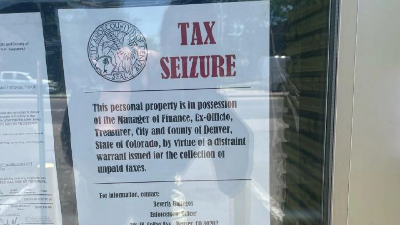 Image of a Tax Seizure notice at a Buddy Boy location in Demver