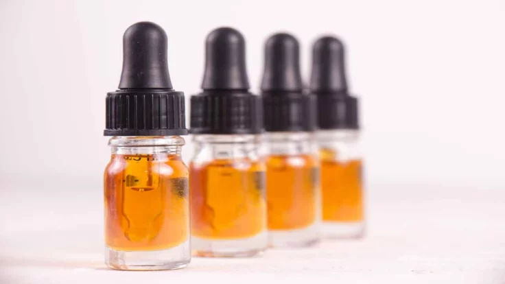 Image of CBD oil in 4 bottles