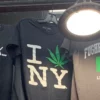 Shirts referencing the newly legal marijuana market in New York City.
