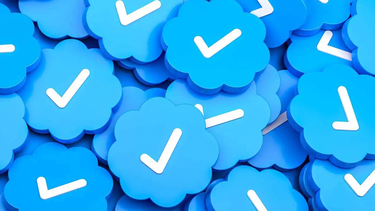 Image of a pile of Twitter Blue check marks