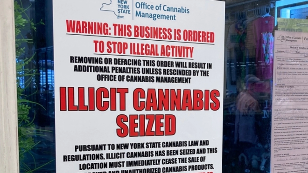 Image of a sign ordering an illicit cannabis business to stop illegal activity