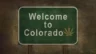 Image of Welcome to Colorado sign with cannabis leaf