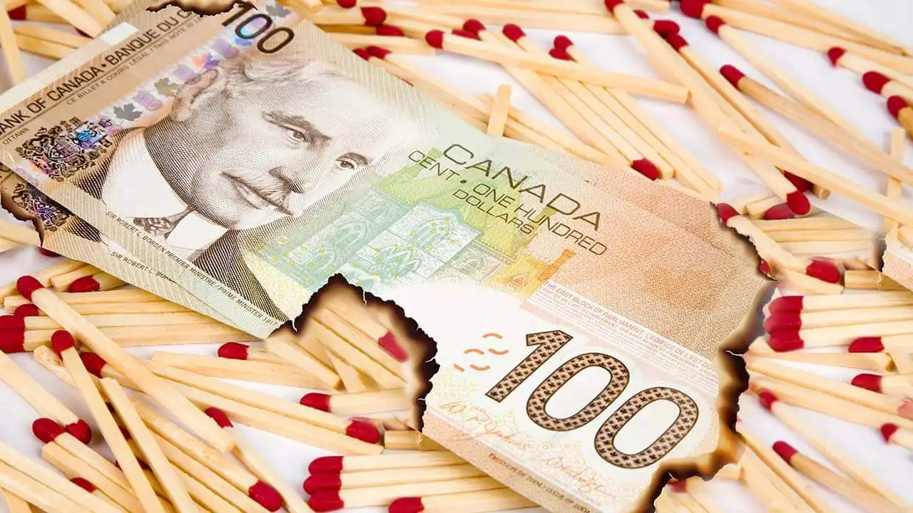 Image of Canadian money burning