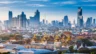 Image of the Bangkok skyline with the Grand Palace in the foreground