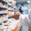 Image of pharmacist filling prescription