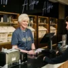Image of customer making a purchase at a retail store owned by The Cannabist Co.