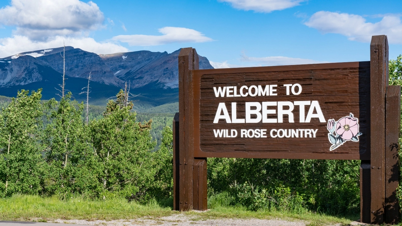 Image of a Welcome to Alberta: Wild Rose Country sign