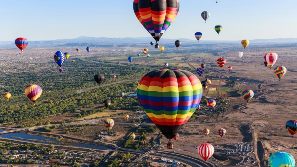 Image of hot-air balloons participating in the Albuquerque International Balloon Fiesta