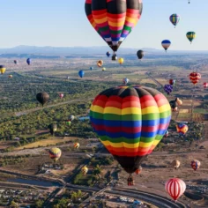 Image of hot-air balloons participating in the Albuquerque International Balloon Fiesta