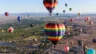 Image of hot-air balloons participating in the Albuquerque International Balloon Fiesta