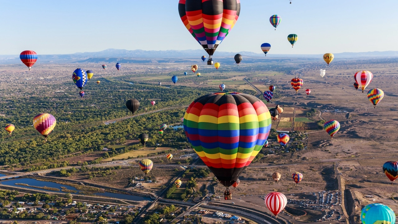 Image of hot-air balloons participating in the Albuquerque International Balloon Fiesta