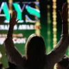 Image of attendee watching The Emjays International Cannabis Awards in 2023