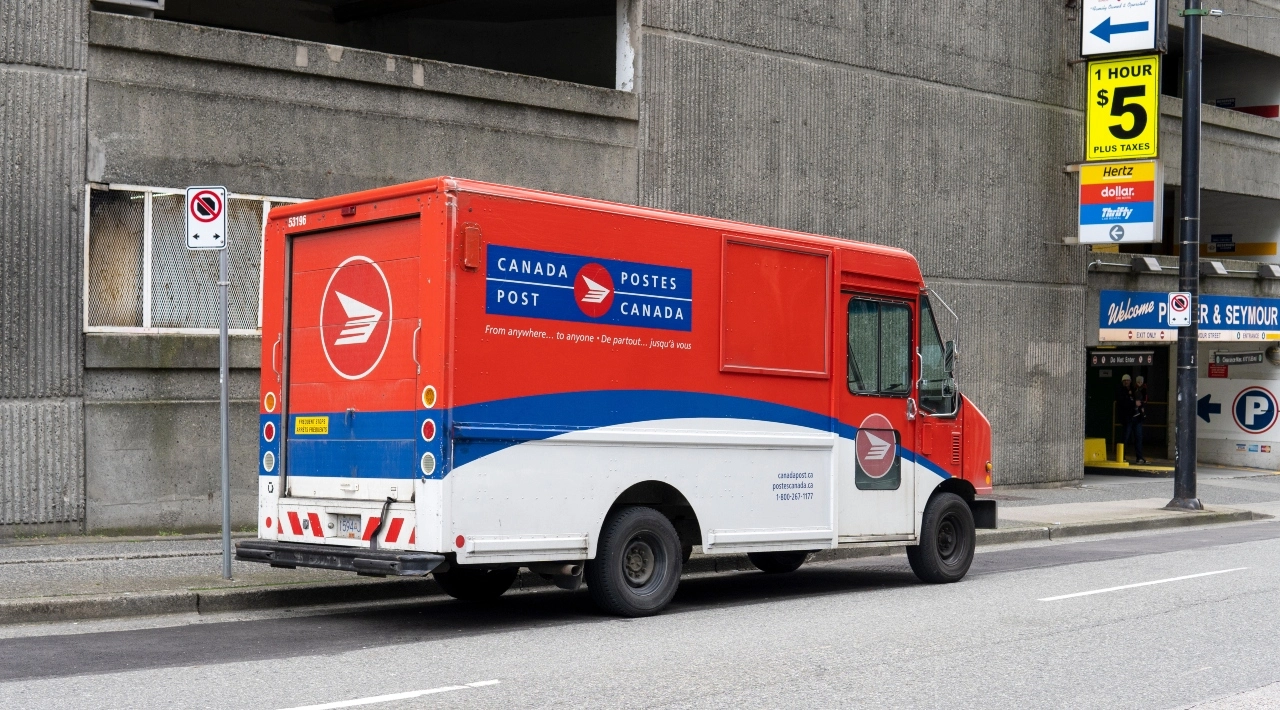 Image of a Canada Post delivery truck on a Vancouver, British Columbia, street