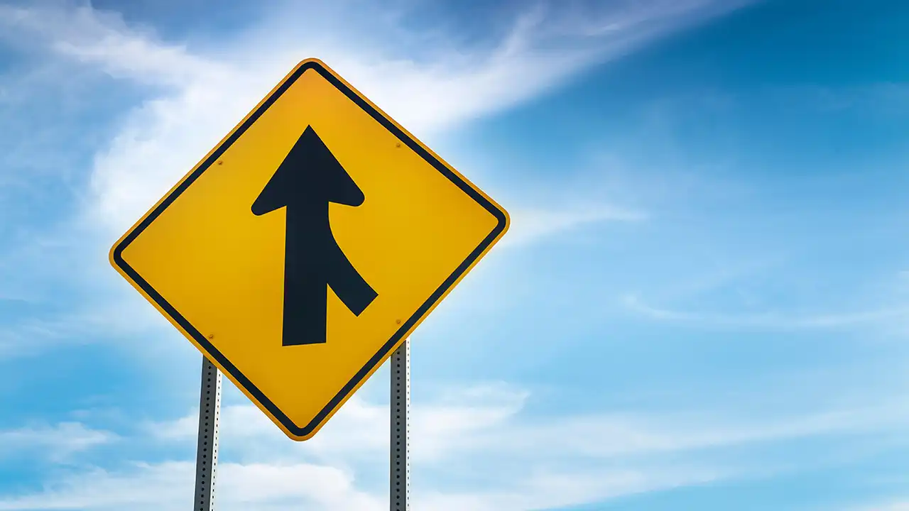 Image of roadside merge sign