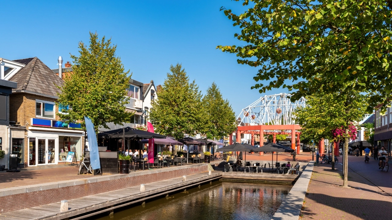 Image of a shopping center near a canal in Drachten, Netherlands, in the region of Friesland province